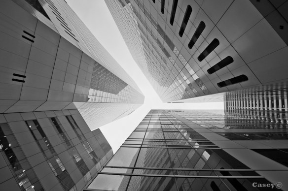 abstract B&W view looking up at the buildings